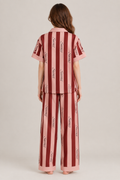 Back view of pink and maroon striped Success pajama set